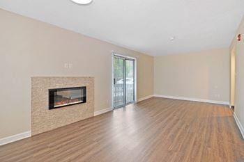 Wood-style flooring throughout living & dining areas